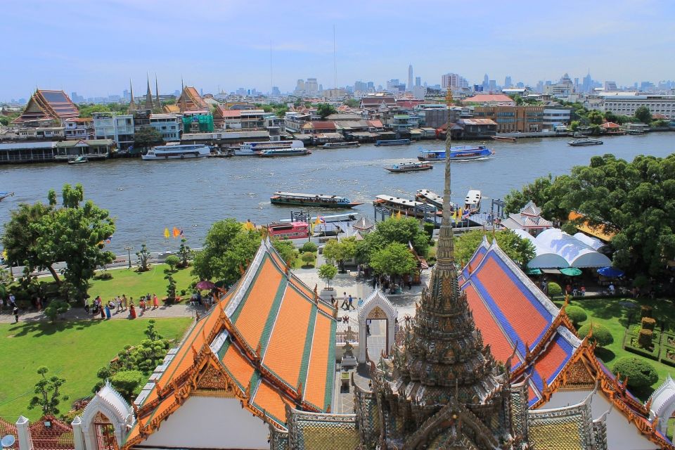 Bangkok: 2-Hour Canal Tour by Teak Boat - Chao Phraya River segment: where you get Wat Arun and the classic skyline angles