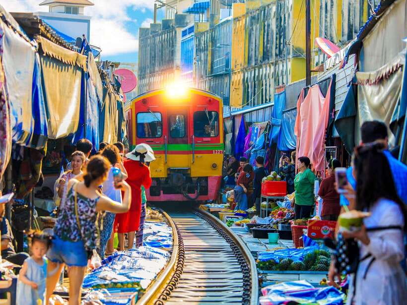 Bangkok: Maeklong Railway & Amphawa Floating Market Day Trip - Maeklong Railway Market: timing the train without losing your bearings