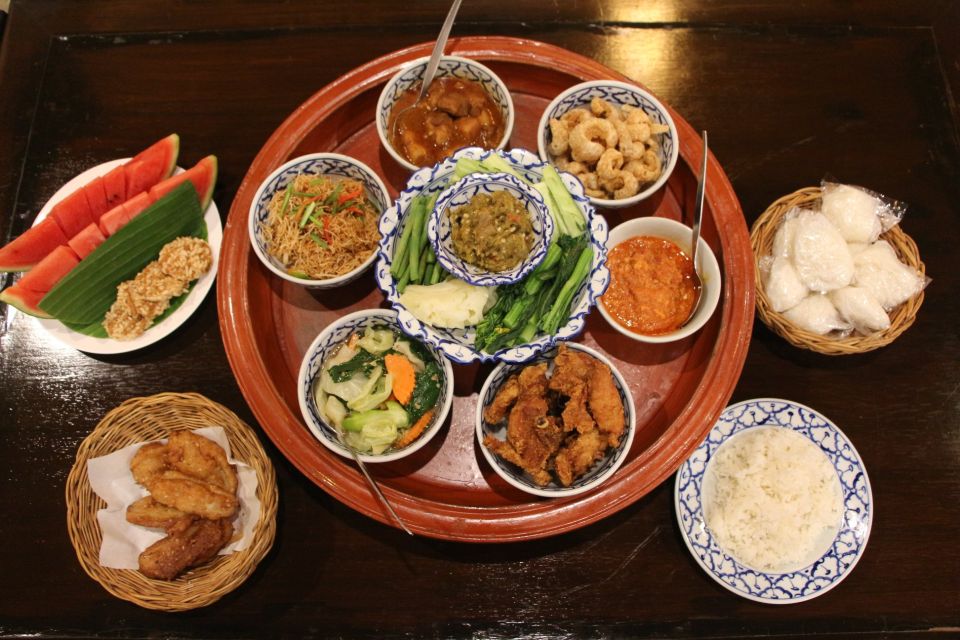 Chiang Mai: Khan Toke Traditional Meal & Dancing Performance - Floor-mat seating, bamboo tables, and photos in costume