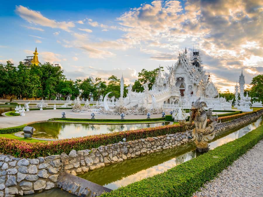 Chiang Rai White Temple and Blue Temple Day Tour - Transportation and timing: AC van, structured stops, and multi-drop logistics