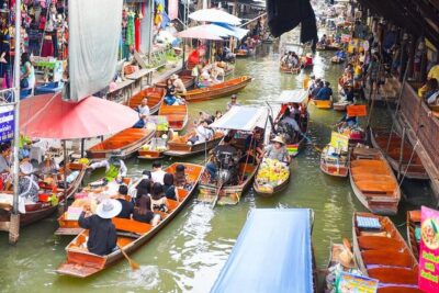 Damnoen Saduak Floating Market and Maeklong Railway Market Tour - Price and value for $44.68: boat, guide, and free admission stops