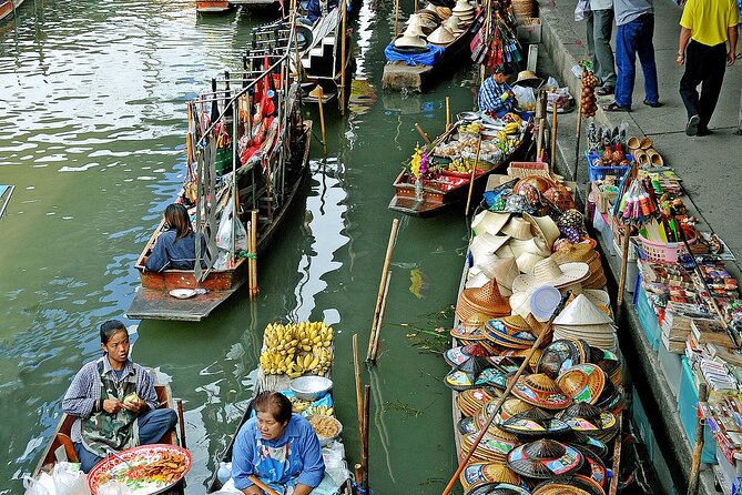Damnoen Saduak Floating Market and Maeklong Railway Market Tour - Maeklong Railway Market (Talad Rom Hoop): the train-and-awnings moment that’s worth the hype