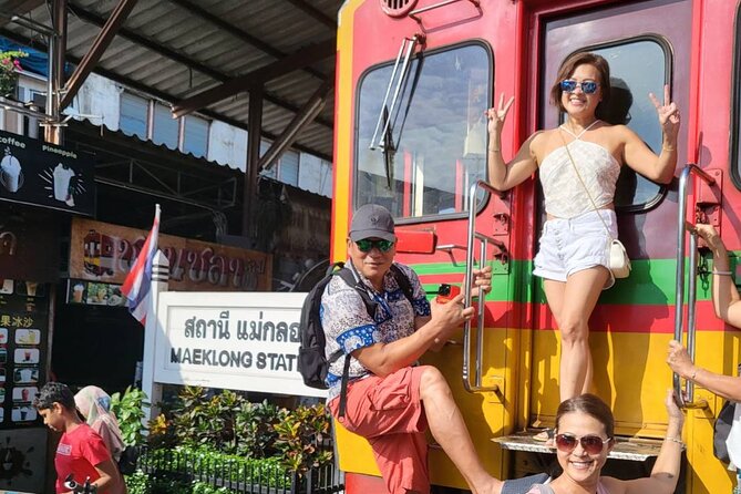 Damnoen Saduak Floating Market and Maeklong Railway Market Tour - Wat Bang Kung (Bot Prok Po): a banyan-root chapel and a story tied to an 18th-century battle