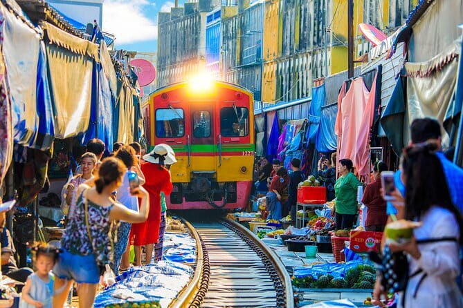 Day Trip to Bangkok Floating Market & Maeklong Railway - Stop 1: Damnoen Saduak Floating Market by long-tail boat