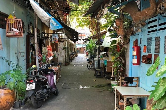 Experience Real Bangkok by Bike - Thonburi across the Chao Phraya: bridge views or a local ferry