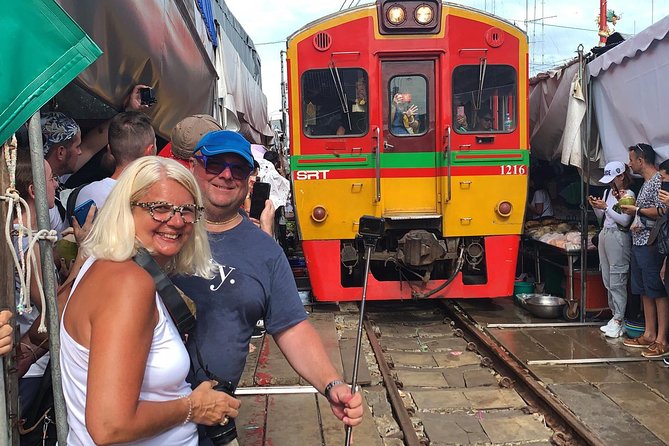 Floating and Railway Market (Optional Waterfall): Private Tour - Coconut sugar farm and Samut Sakhon salt fields: small stops with big context