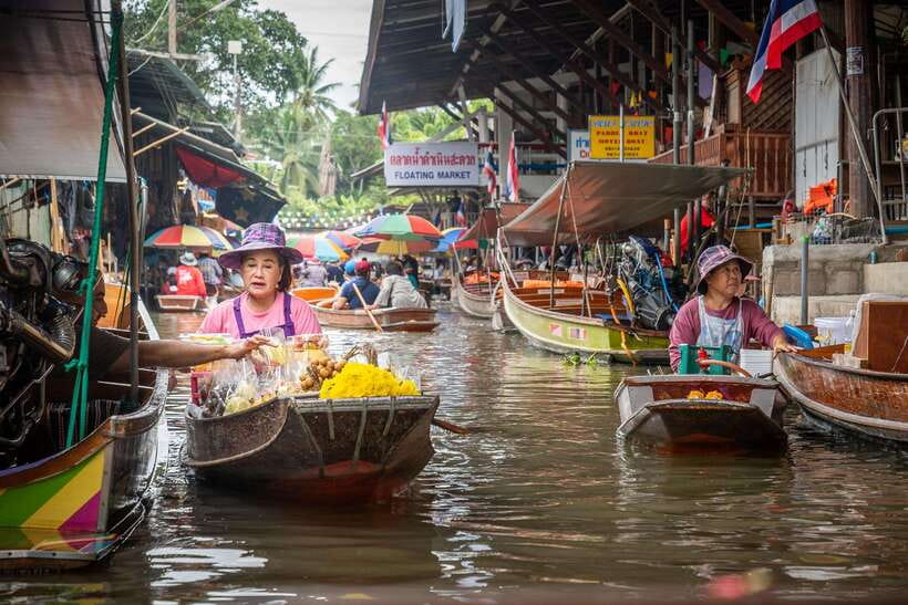 From Bangkok: Railway & Damnoen Saduak Floating Market Tour - Damnoen Saduak floating market: shop, snack, and manage the crowds