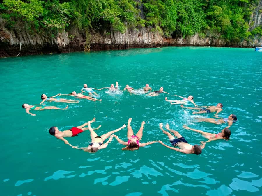 From Krabi: Phi Phi Early Bird & 4 Islands by Speedboat - Snorkeling stops built for seeing fish