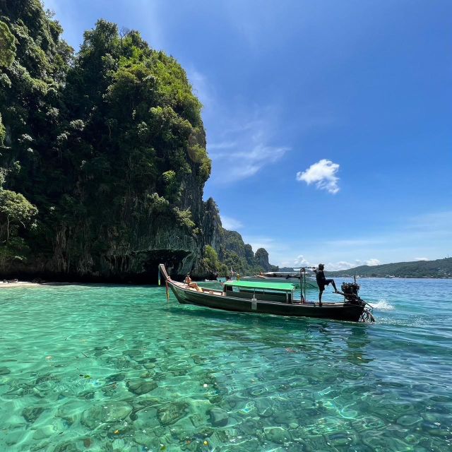 From Phi Phi: Half-Day Longtail Boat Tour with Snorkeling - Boats, Group Size, and How the Guide Runs the Day