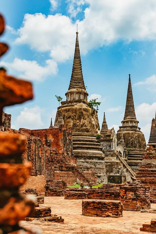 The Old Siam: Ayutthaya Temples Small Group Tour with Lunch - Wat Mahathat and the Bodhi tree Buddha head: the photo, plus the meaning